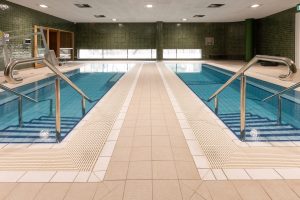 Front view of hot recovery pool and cold plunge pool.